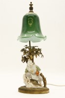 Lot 221 - A Chinese porcelain figure