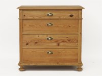 Lot 571 - A pine chest of four graduated drawers