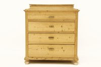 Lot 564 - A Continental pine chest of four graduated drawers