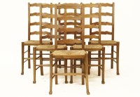 Lot 635 - Six beechwood ladderback single chairs