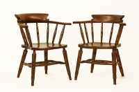 Lot 704 - A pair of beechwood and elm smoker's bow chairs