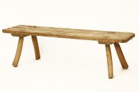 Lot 568 - A pine pig bench