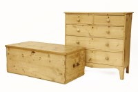 Lot 697 - A stripped pine chest of two short and three long drawers