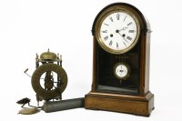 Lot 304 - A late Victorian mahogany mantel clock