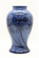 Lot 302 - A Moorcroft 'Powder Blue Cornflower' baluster vase