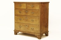 Lot 672 - A George III oak chest of two over three drawers