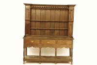 Lot 581 - An 18th Century oak dresser