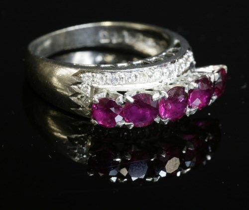 Lot 201 - A ruby and diamond ring