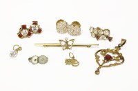 Lot 275 - A 9ct gold single stone diamond butterfly bar brooch