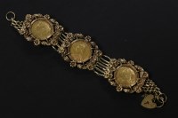 Lot 26 - A gold seven row gate link bracelet