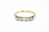 Lot 273 - A gold graduated five stone diamond ring