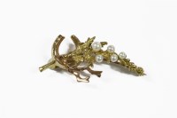 Lot 310 - A 9ct two colour gold horse shoe and fern brooch by Alabaster & Wilson