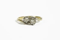Lot 205A - A two stone diamond crossover ring