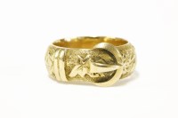 Lot 229 - An 18ct gold buckle ring