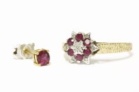 Lot 213 - A gold illusion set diamond and ruby cluster ring