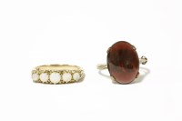 Lot 231 - A 9ct gold five stone opal ring