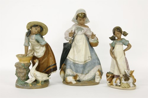 Lot 436 - Three Lladro gres figures
