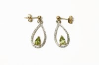 Lot 252 - A pair of gold Peridot drop earrings