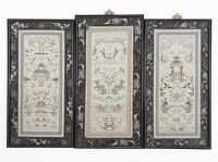 Lot 655 - A set of three framed Chinese embroidered silk panels