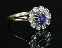 Lot 375 - A sapphire and diamond circular cluster ring