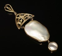 Lot 144 - A gold Arts and Crafts blister pearl pendant