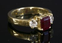 Lot 297 - A ruby and diamond three stone ring
