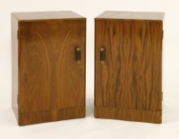 Lot 109 - A pair of walnut bedside cabinets