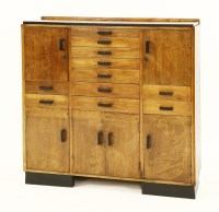 Lot 111 - An Art Deco oak and ebonised dentist's cabinet