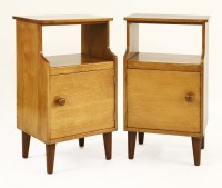 Lot 240 - A pair of oak bedside cupboards
