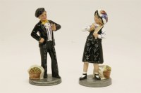 Lot 232 - A pair of Royal Doulton figures