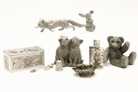 Lot 115 - A cast silver model of two cats