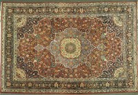 Lot 703 - A hand knotted Persian carpet