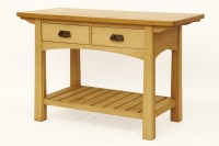 Lot 680 - A bespoke Arts and Crafts style oak side table