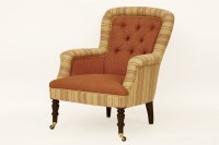 Lot 677 - An upholstered arm chair