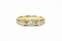 Lot 60 - A gold three stone diamond ring