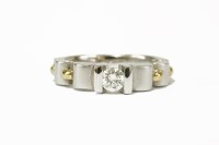 Lot 6 - A two colour gold single stone diamond ring