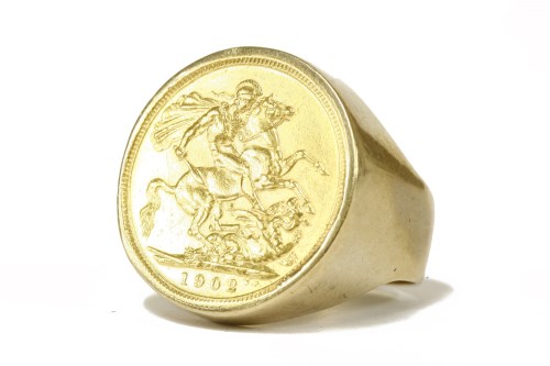Lot 38 - A 9ct gold sovereign ring with coin dated 1902