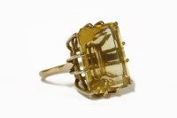 Lot 21 - A 9ct gold single stone emerald cut citrine ring