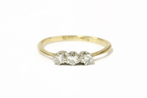 Lot 17 - A gold three stone eight cut diamond ring