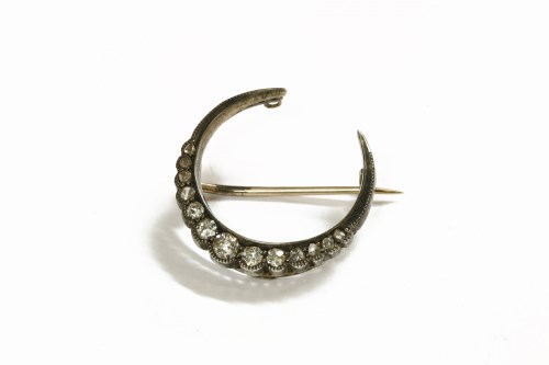 Lot 50 - A late Victorian diamond set cased crescent brooch