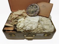 Lot 255A - A suitcase of antique lace and linens