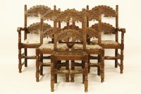 Lot 695 - A set of six reproduction oak armchairs