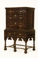 Lot 527 - A 17th century style oak chest on stand