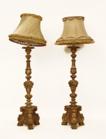 Lot 687 - A pair of gilt wood lamp standards