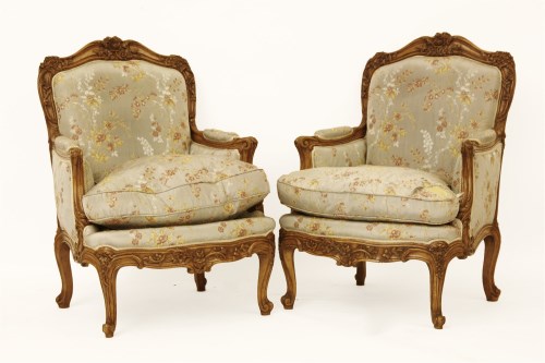 Lot 503 - A pair of large modern French carved walnut armchairs. 71 x 74 x 112cm high