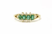 Lot 36 - An 18ct gold five stone emerald ring