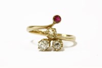 Lot 8 - An Art Nouveau four stone ruby diamond and citrine ring