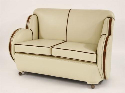 Lot 120 - An Art Deco cream leather settee