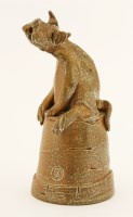 Lot 182 - A stoneware figure of an howling dog