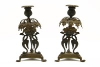 Lot 336 - A pair of 19th century bronze candlesticks